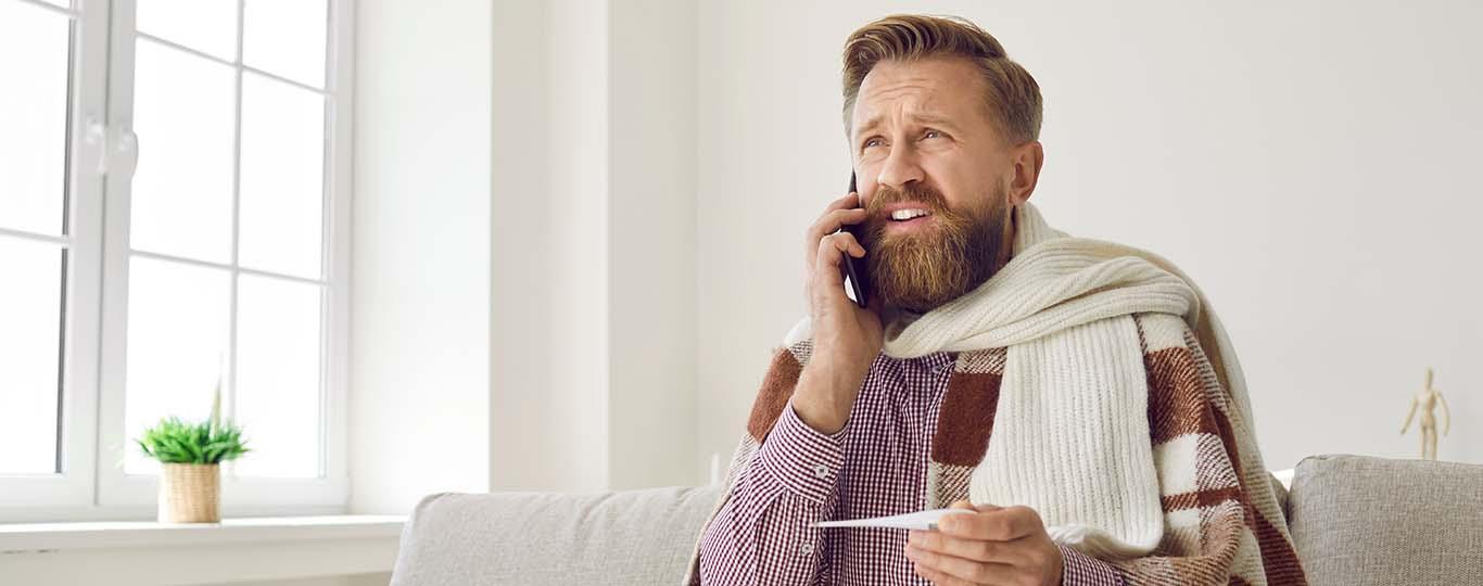 zieke man verwittigt zijn werk