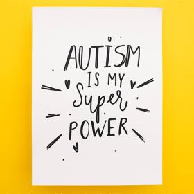 Blad met geschreven tekst 'Autism is my superpower'