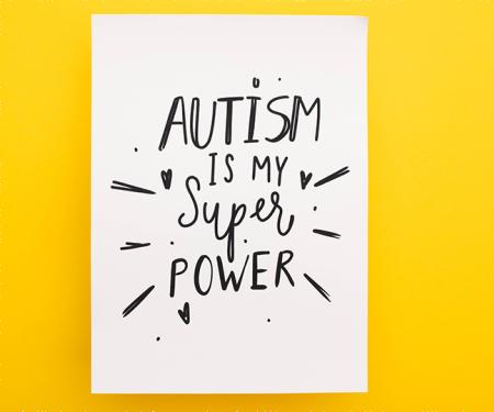 Blad met geschreven tekst 'Autism is my superpower'