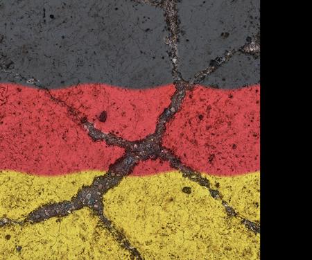 Duitse vlag op betonnen muur vertoont barsten